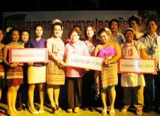 The winners and dancers pose for the press.